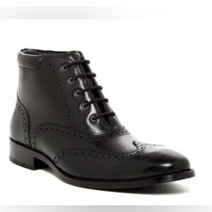 Cole Haan Williams Wing Tip leather boots in black.